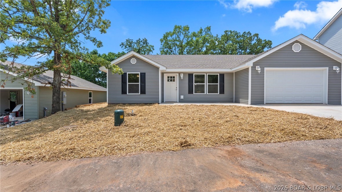 NEW QUALITY BUILD! Modern living in this new three-bedroom, two-bath home nestled on a cul-de-sac in the desirable Oak Hill Forest Subdivision and School of the Osage school district. The bright, open-concept layout creates a seamless flow for everyday living and entertaining, featuring a spacious kitchen with stainless steel appliances. Enjoy the convenience of angarage and a relaxing back deck, all on a single level. Perfectly located between Eldon and Lake Ozark, this home provides quick access to the Bagnell Dam Strip, where you’ll find excellent shopping, dining, and lakeside entertainment. This thoughtfully designed new construction blends peaceful country surroundings with the excitement of lake adventures, delivering the best of both worlds in a quiet setting.