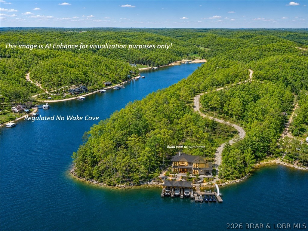Rare opportunities like this are becoming increasingly difficult to find. This breathtaking south-facing point property offers exceptional waterfront in a large, boat-friendly cove with panoramic lake views, deep water, and expansive shoreline. Premium waterfront properties are a finite resource, and few can match the beauty, privacy, and desirability of this remarkable Lake of the Ozarks setting. Trustee for the trust is a lisenced real estate agent. Must have a scheduled appointment to see and /trustee/agent to accompany all showings.