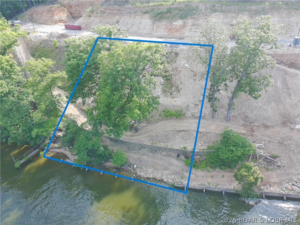 Be one of the first to buy your new lot at one of the Ozarks hottest new subdivisions, The Waters. The Waters is located at Horseshoe bend on the 3 MM of the lake. There are 27 different lot locations and each have their own unique layout and characteristics. Fantastic views of the 3 MM looking out onto the deep water cove. There are several great water hangouts like Boathouse, Tap & Grill, and Shady Gators only minutes away. Two amazing Four Seasons golf courses within 5 minutes, along with countless lake activities to enjoy. Supply is limited so do not hesitate. Take your once in a lifetime opportunity to build your dream home at The Waters today!