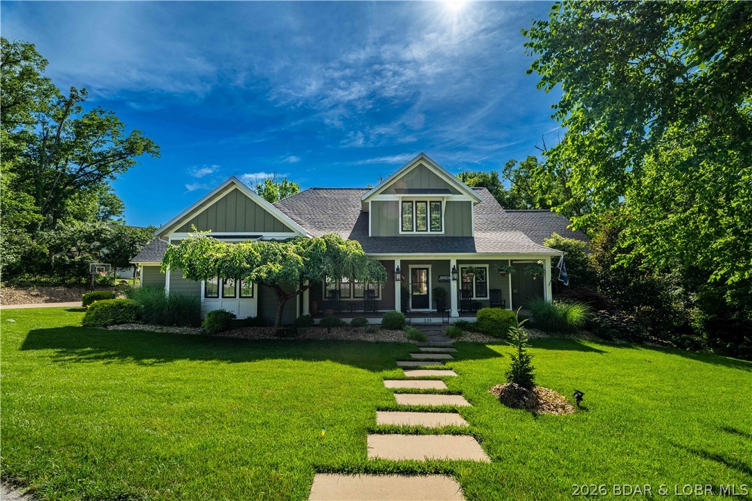 One of the most unique opportunities in Osage National, this sprawling estate sits on two lots at the end of a quiet cul-de-sac and offers over 5,400 square feet of beautifully updated living space. EVERYTHING you see stays. Designed for those who love to entertain, the home features multiple gathering areas, a stunning remodeled kitchen with gas range, double ovens, custom cabinetry, and an inviting hearth room. The backyard feels like a private resort with a heated and chilled pool, screened porch, open-air deck, and fenced yard surrounded by mature trees for exceptional privacy. The thoughtful floor plan offers comfortable main-level living along with a private guest suite and abundant space for family and friends. Hardwood floors, two gas fireplaces, three HVAC systems, a flat driveway, oversized 3-car garage, mudroom with built-ins, and a new roof in 2025 add everyday convenience. Enjoy golf cart access to championship golf, Eagle View Bar & Grill, the community pool, and all the amenities that make Osage National one of the Lake's premier communities. Minutes from nearby marinas, this is a rare combination of luxury, privacy, and lifestyle that's difficult to replicate.
