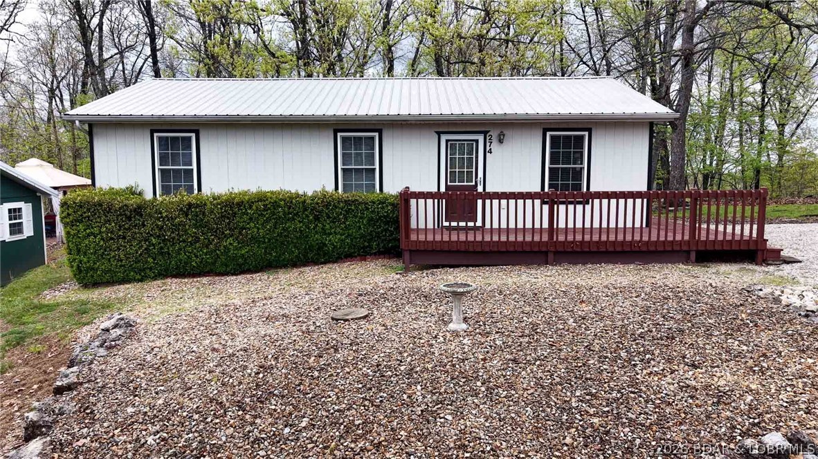 Location is everything at the lake — and this one has it. Whether you're looking for a place to call home or a long-term investment that practically markets itself, the location alone makes this one worth a serious look. But the location is just the start. Step outside and you'll find something that's genuinely hard to come by in this price range, an oversized lot plus an additional adjacent parcel, giving you space, breathing room, and flexibility that most properties around here simply can't offer. Want room to spread out? You've got it. Need extra storage or a place to work on your toys? The bonus shop takes care of that too. And with a concrete circle drive out front, the curb appeal and functionality are already there waiting for you. Bring the family and enjoy the space and the setting. Or let the location do the work as a dependable long-term rental in a market where renters want to be. Either way, the outside space, the extra lot, and the address make a compelling case all on their own. Properties with this much land and this kind of location don't come around often, and when they do, they don't last. Come walk the property and see what's possible!