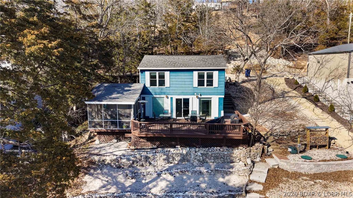 Tucked along the shoreline in year-round deep water, this lakefront cabin is the kind of place families buy to make memories for years to come. From mornings on the screened porch to afternoons on the dock and evenings on the oversized lakeside deck, this home was built for enjoying the lake lifestyle.

The home offers 3 bedrooms, 2 bathrooms, plus additional heated and cooled sleeping space for extra guests. Major updates have already been completed, including remodeled interiors, newer well and septic, and the home comes furnished so you can start enjoying it immediately.

The easy walk to the 2-well dock with swim platform, hoist, and storage makes lake days effortless. Located in deep water with a protected feel, this setup is hard to find at this price point. Rentals are allowed, giving flexibility for full-time living, weekend use, or investment potential. By water, you’re close to Jolly Rogers, Coconuts, and Tap & Grill while still feeling tucked away in your own private lake retreat. Room to add more parking or a garage in needed.