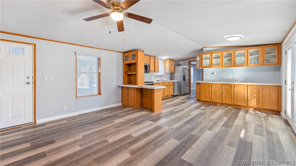 Completely refreshed and move-in ready, this beautifully remodeled 2 bedroom, 2 bathroom home offers stylish updates, practical improvements, and affordable peace of mind. Inside, you'll find a well-designed open layout with tasteful modern finishes throughout including fresh paint, updated flooring, stainless steel appliances, and sleek contemporary fixtures that create a clean, inviting feel. A convenient mud/entry room adds valuable functionality with ideal space for extra storage, pantry use, or additional appliances. Built with low-maintenance materials and thoughtfully upgraded where it counts, this home is designed to help keep future repair costs in check with a new well pump, HVAC system, deck, and appliances already in place. The gently sloping lot offers usable outdoor space with room to easily add a garage or shop if desired. Set on a concrete block foundation, this property blends comfort, function, and value into one attractive package. Whether you're looking for an easy full-time residence or a smart investment, this one checks all the boxes.