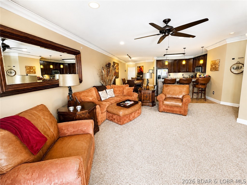 Gorgeous Walk-In Level Condominium with Elevator Access at the Amazing Lands' End Resort Condo Complex! Incredible Main Channel Views from this 3 Bedroom, 3 Bath provide amazing sunsets. Over 1700 square feet, Penthouse feel on the Walk-In Level! Main Level Luxury Living! Huge Primary Suite Lakeside with Private deck access, Dual Vanity Sinks, Jetted Tub, Walk-In Closet and Walk-In Shower. Additional Large guest En-suite and Additional Suite with Full Bath Attached which provides hall Full Bath Access.  Full-Size Laundry Room with Washer/Dryer and Water Softener. Very Spacious Kitchen with Stainless Steel Appliances. Large Entry and Living Area with Gas Fireplace. Custom Tile Deck Lakeside with Glass Railing System. Lands' End Offers amazing amenities including a Pool, Lazy River, Play Ground and a Club House with Exercise Equipment. Lands' End is a Premier Condo Complex in the Heart of All the Action and Fun! Shopping and Groceries located literally down the street, Jets Trampoline Park, Dog Days, Wobbly Boots BBQ, Lil Rizzos, Andy's Frozen Custard and Most of All, The Proposed Oasis Amusement and Water Park! Nightly rental is permited for Investment as well! A Must See!
