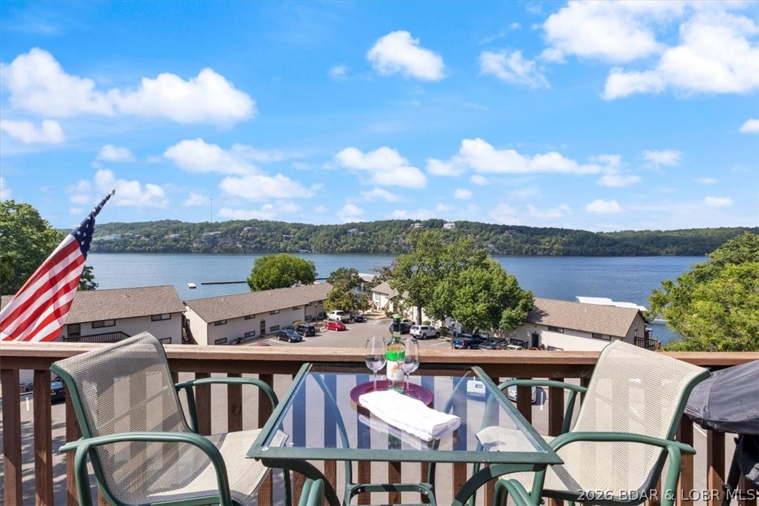 Welcome to Weston Point Resort! This amazing TOP FLOOR condo is conveniently located minutes from shopping and lakeside dining, including redheads, shorty pants and the ever so popular Margaritaville. This 1 bed 1 bath condo is complete with a 10x24 covered slip and has amazing views of the main channel located in the heart of Osage Beach. The complex offers pool, tennis courts and a convenient boat ramp as well as trailer parking that is just around the corner from the front door. Fisherman’s dream! Looking for an investment property? This condo has an amazing rental history! The perfect blend of warmth, comfort, location & amenities, Fresh paint through out and is 100% turnkey! With this view it will not last long!