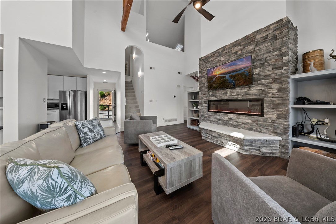 Experience elevated Lake of the Ozarks living in this furnished, updated top-floor end unit condo in the highly desirable Emerald Bay community. This spacious 4-bedroom, 3-bath lakefront condo offers breathtaking main channel views and added privacy, with abundant natural light throughout. The open-concept layout is designed for entertaining, featuring Luxury Vinyl Plank flooring, an electric fireplace, and a large private deck perfect for enjoying sunrise coffee or sunset lake views.

Included is a 12x44 boat slip, giving you easy access to boating, fishing, and waterfront fun. Whether you're searching for a full-time residence, vacation getaway, or investment property with strong short-term rental potential, this condo checks every box.

Emerald Bay amenities include two pools, tennis courts, a fitness room, and close proximity to golf courses, waterfront dining, shopping, and entertainment. With updated finishes, spacious living areas, and one of the best locations at Lake of the Ozarks, this condo offers the perfect blend of luxury, convenience, and lake lifestyle. Don’t miss this rare opportunity to own a premier lakefront condo in Emerald Bay. See virtual tour.