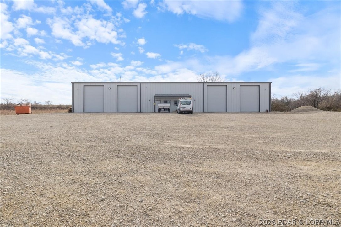 HIGH YIELD COMMERCIAL WAREHOUSE INVESTMENT PROPERTY

Secure a cash flowing industrial asset in a prime commercial corridor. This massive 60x120 engineered building is strategically split into a 2 unit commercial shop layout, offering an ideal setup for an investor or an owner user looking to subsidize their overhead immediately.

The first unit is a proven revenue generator, currently leased at 3500 dollars per month on a strong 1.5 year term. The tenant has invested an additional $60000 dollars in premium interior build out, anchors their commitment to the site and instantly elevating the property value. The second unit is currently owner occupied for storage but will be delivered vacant, offering immediate lease up potential to double your rental income or providing the perfect turnkey operational space for your own business.

Designed for maximum efficiency and low overhead, the property features a shared well and septic system to keep monthly maintenance costs at an absolute minimum. With heavy duty construction, high clearance bays, and dual tenant capability, this versatile commercial tract is built to perform. Add this high yield powerhouse to your portfolio today!