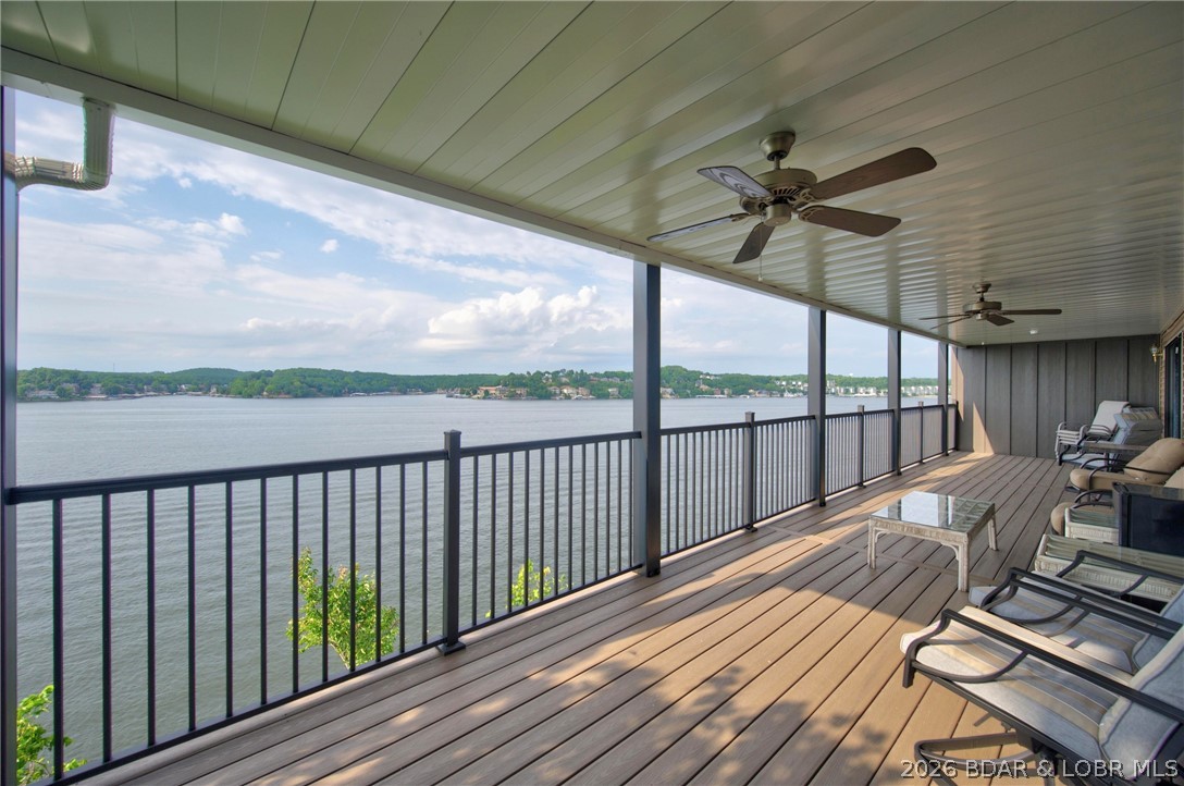 Life at Lake of the Ozarks is calling with this Gorgeous Condo with Magnificent Main Channel views! 3 bedroom, 3 bathroom, completely turn-key with garage and 16'x35' boat slip. NO STEPS to the front door & garage right behind you-NO STEPS! Take the elevator to Dock 3 slip 31- NO STEPS! Two lakefront bedroom ensuites with unbelievable lake views.  Fantastic kitchen with all kinds of room for cooking, entertaining, or just gathering. Convenient wet bar serve area. Third Bedroom has its own private deck making that bedroom super special for your guests. Spacious living room and of course, the star of the show, the 180 degree view off the deck! THE VIEW GOES ON FOR MILES. Great amenities include point pool, playground, upper pool and deck, designated dog area, the second pool is closer for these bluff condos. The closest pool setting includes a gazebo, bathrooms and decks over looking the lake.    Relax and sit back with this Lake of the Ozarks condo.  It is ready and waiting for you!