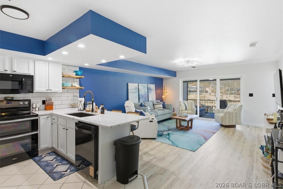 Enjoy the best of lake living in this beautifully renovated 3 bedroom, 2 bathroom condo offering approximately 1200 sq ft of updated living space in a highly convenient Lake of the Ozarks location. Just 5 minutes from the Strip, this property puts you close to dining, entertainment, shopping, and all the fun the lake has to offer.
Inside, you’ll appreciate the extensive updates throughout, including new appliances, flooring, fixtures, bedding, kitchen items, and furniture, creating a stylish and move-in-ready space. The layout offers plenty of room for family, guests, or weekend entertaining.
This unit is a rare find with only 7 stairs to enter, making access easier than many lake properties. The community also offers fantastic amenities, including a heated/chilled pool open May through October, swim dock, and two pet area locations.
Whether you’re searching for a personal getaway, full-time residence, or an investment opportunity, this condo offers excellent flexibility and could be used as a nightly, weekly, or other rental, depending on your plans. With its updated interior, desirable amenities, and prime central location, this condo is ready to be enjoyed from day one.