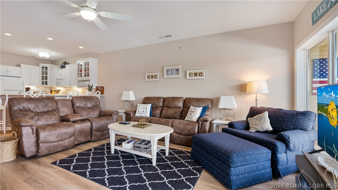 Discover lake living at its best with this beautifully updated 3 bed, 2 bath furnished condo at Lake of the Ozarks! This move-in-ready unit includes a 12x30 ft. boat slip and features numerous upgrades including updated living room flooring, kitchen cabinets, backsplash, tiled shower, HVAC, water heater, refrigerator, and dryer. The screened, tiled deck offers peaceful lake views—perfect for unwinding after a day on the water. The lakeside master suite features a private bath and walk-in closet for added comfort and convenience. Located at the 12 MM, you’re just minutes from some of the lake’s most popular attractions by land or boat. Bristol Bay is a well-maintained complex offering a lakeside pool, clubhouse, promenade, and fire pit. A garage is also available for additional purchase. Whether you're searching for a weekend retreat or full-time lake living, this condo is ready for you to start enjoying the lake lifestyle!