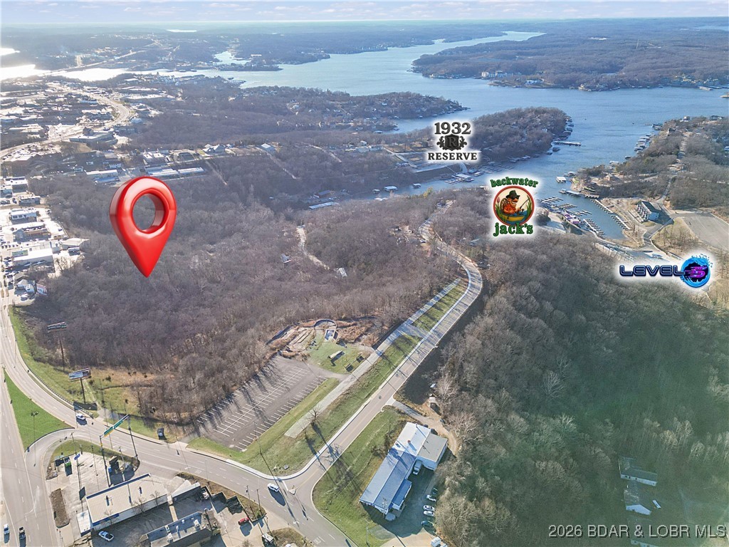 Have an opportunity to own 6+ acres of commercial real estate in the Heart of Osage Beach. The property currently has a Billboard that pays the owner $400 a month. The land sits across from Wal-Mart with prime visibility on Osage Beach Parkway. The property is located next to popular lake hot spots like Backwater Jack, 1932 Reserve, and Level 5 Pool Bar. This property is a blank canvas with lots of possibilities.