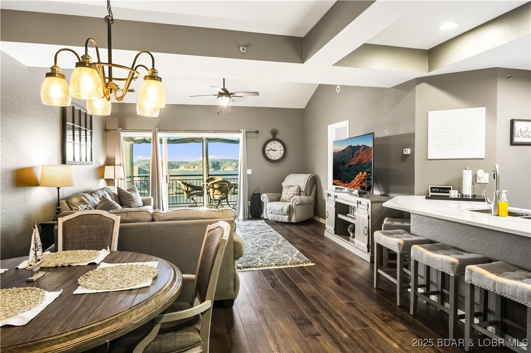 Welcome to your dream retreat! This immaculate 3-bedroom, 2-bath condo at Westshore Falls offers unparalleled privacy as a top-floor end unit, with no neighbors above to disrupt your serene escape. Experience stunning views and breathtaking sunsets from your spacious haven featuring vaulted ceilings that enhance the open and airy feel.  Meticulously updated, this condo showcases newer flooring, elegant quartz countertops, and stainless steel appliances, ensuring a modern and stylish living environment. The tasteful color scheme and quality furnishings make it move-in ready!  Included with this incredible condo are two boat slips in dock 5, with sizes perfect for both larger vessels (16x38 with shore power) and personal watercraft. Additionally, a garage is available for purchase, offering convenient storage for your lake gear and toys. This unique combination of features makes this property the ultimate package for lake living. Whether you're seeking a full-time residence or a luxurious getaway, this well-appointed condo is ready to welcome you home. Don’t miss your chance to own this slice of paradise at Westshore Falls!