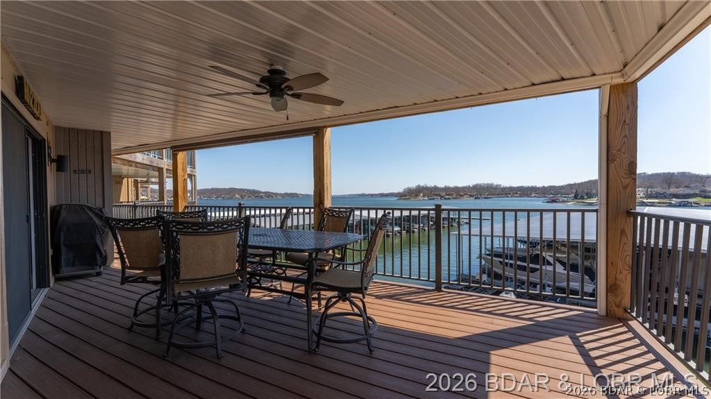 This condo is a wonderful ground-floor, end-unit at Sunrise Ridge that puts the main channel literally in front of your door. Three bedrooms, two baths, 1,674 sq ft, fireplace, full appliances, and completely turn-key for less than $300k — walk in, drop your bag, grab a boat key. Speaking of boats: your 14x40 covered slip is ready and waiting with a big lift at the 10 mile marker. Deep water. Wave breaks. Main channel views. This is the kind of dock access people spend years trying to lock down. Beyond the water, Sunrise Ridge delivers — resort-style pool, hot tub, tennis and pickleball courts, clubhouse with poker room, sauna, gym, etc, boat ramp, and trailer parking. End-unit privacy. Bottom floor convenience. There is also a storage area for all of your water toys at the complex! Schedule a showing now and don't miss out on this great opportunity!