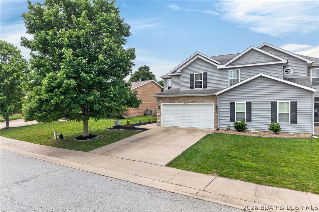 At the Lake of the Ozarks & in the heart of OSAGE BEACH. This home is simply a few minutes to almost everything & the Expressway. Prepare to be IMPRESSED w/ this 1656 SqFt, 3 Bed/3Bath Impressive & Classy 2 Story TOWNHOME w/lovely Staircase & desirable Floor Plan is ideal for a Permanent Home or a Rental Property for the INVESTOR. In a nice, clean & friendly quiet neighborhood w/ Sidewalks on a Cul-de-sac Street. Attached Clean Drywalled 2 Car Garage & Extra Prk’g in Driveway. Spacious & Lovely Kitchen w/ SS Appliances, Lots of Cabinets & Counter Space, Walk-in Pantry & Brkfast Bar. Large Mast Bedroom w/Spacious Sitting/Desk Area w/Cathedral Ceiling & 2 Lrg Windows. Spacious Master Bath w/ His & Her Closets. 2 Guest Bdrms w/Walk-in Closets & Coffered Ceil’gs. Dining Area just off of the Kitchen. Covered Patio off of Din’g Rm. Laundry Area w/Washer & Dryer. Lovely Landscaped Walkway to Covered Front Entry Door. Irrigated Yard is include in the Reasonable HOA Fees. Minutes to New Entertainment Park & Outlet Mall, Restaurants, Groceries, Hospital, 2 Marinas within 1-3 minutes w/Boat Slips to Rent. Camdenton Schools. MUST SEE the Detailed EXTRA FEATURE SHEET for MORE INFORMATION!!!