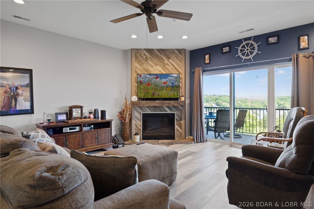 Experience lakefront living at its finest in this beautifully updated 3-bedroom, 2-bath condo overlooking the breathtaking Big Niangua at the 13-mile marker. Perched perfectly for million-dollar views and direct lake access, this lower-level, fully handicap-accessible unit offers comfort, convenience, and style. Enjoy luxury vinyl plank flooring, tile finishes, and a spacious walk-in shower complete with grab bars. The open-concept layout flows seamlessly to outdoor living where you can take in panoramic water views. Included is a coveted 10x24 boat slip in the community dock, plus a garage is available for extra $$. Handicap parking is conveniently located nearby, making access effortless. Whether you're looking for a full-time residence or the perfect lake getaway, this condo combines accessibility, luxury, and unbeatable lakefront living.