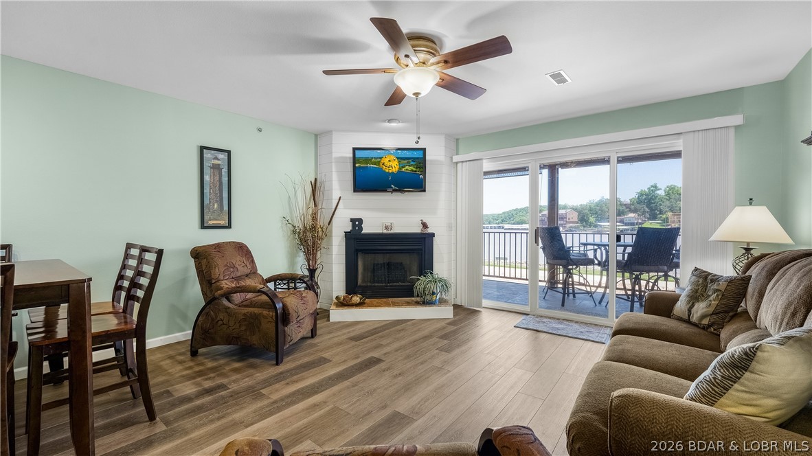 Walk right in and start enjoying lake life with no steps from parking to the condo, pool, or dock. This well-maintained three-bedroom, two-bath lakefront condo features a screened patio with tile flooring, an unobstructed lake view, and a grassy lakeside area just outside your door. The included 10x30 boat slip with hoist makes getting on the water effortless, while a garage is available for additional consideration. Stroll the lakefront boardwalk, relax by one of two heated pools, enjoy the playground, boat ramp, trailer parking and expansive green space. Conveniently located just off Highway 54 near Lake Valley Golf Club and Old Kinderhook, this property offers the perfect blend of comfort, convenience, and the lake lifestyle you’ve been looking for.
