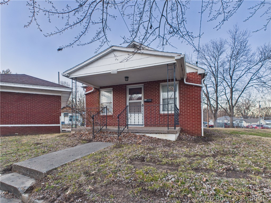 Great location for this cute brick home that is within walking distance to the Isle Casino, Katy Recreation Trail, and downtown Boonville. Corner lot with a one-car detached garage that was a former gas station, and could be restored as such, brick pillars remain as corners of the garage. The house is in great shape with new HVAC just installed. It also has newer carpet and LVP flooring throughout. The living room is large enough to accommodate the dining area. Functional kitchen with room for a desk. The bedroom has the bathroom adjacent. There is an enclosed porch that can be a second non-conforming bedroom or office. Unfinished basement. Don't miss your chance on this affordable, easy to maintain property. Call an agent for your showing.