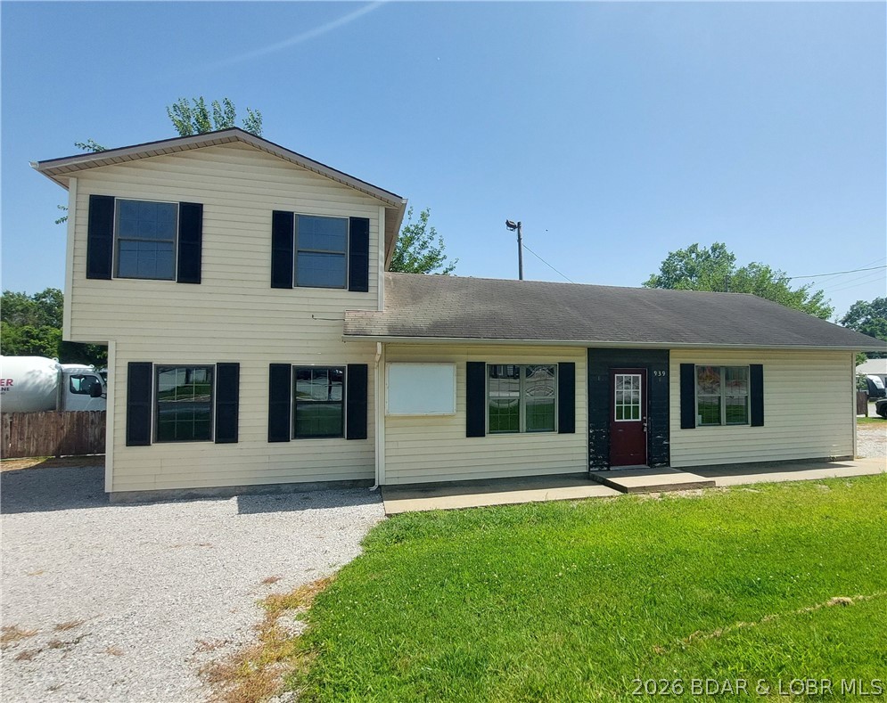 Now available, this commercially zoned building at 939 East Main Street, Warsaw, Missouri, offers an excellent opportunity for an owner-user, investor, or entrepreneur looking to establish or expand a business. Situated on a well-traveled Main Street with excellent visibility, this vacant property is ready for its next chapter.  The building offers a flexible layout that can accommodate a variety of commercial uses, including retail, office, professional services, boutique, studio, showroom, or other business ventures permitted by local zoning. Its vacant status allows a new owner to customize the space to meet their specific needs without waiting for an existing tenant to vacate.  Whether you're launching a new business, relocating an existing operation, or adding to your investment portfolio, this property presents a rare opportunity to own commercial real estate in the heart of Warsaw, Missouri.. The convenient location provides easy access for customers and employees while benefiting from established surrounding businesses and community traffic. Bring your vision and discover the possibilities this versatile commercial property has to offer!