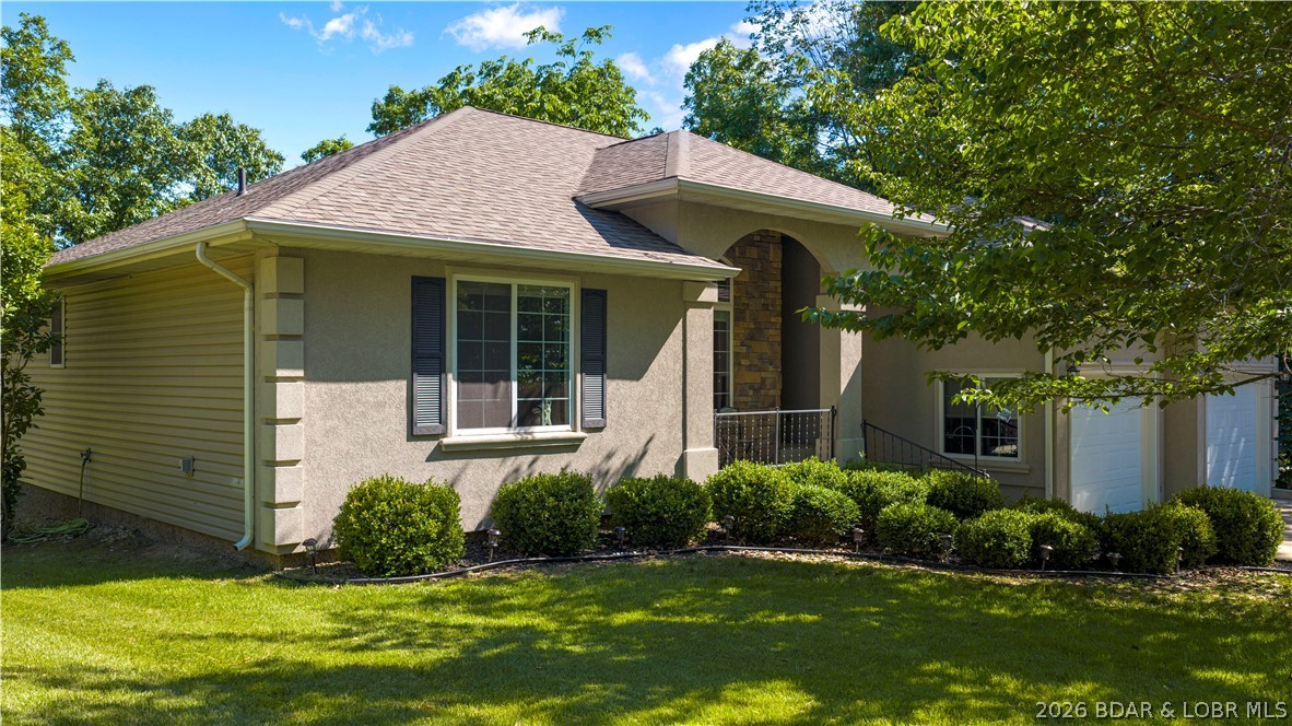 Experience the perfect blend of comfort, style, and functionality in this beautiful 4-bedroom, 3-bath ranch-style home featuring vaulted ceilings, an open floor plan, and a fully finished walkout basement. The oversized kitchen is ideal for entertaining guests or gathering with family, complete with tile flooring, granite countertops, and easy access to the large screened-in porch overlooking seasonal lake views.
This home truly stands apart with its modern feel, spacious layout, and two separate living areas offering flexibility for family, guests, or recreation. The lower level features an additional living space, wet bar, and convenient walkout access to the backyard, making it perfect for entertaining.
Enjoy the gentle lot, level driveway, and relaxing backyard firepit area—ideal for evenings outdoors. With a fantastic floor plan, inviting living spaces, and attractive outdoor features, this home is designed to impress buyers looking for both comfort and lifestyle.