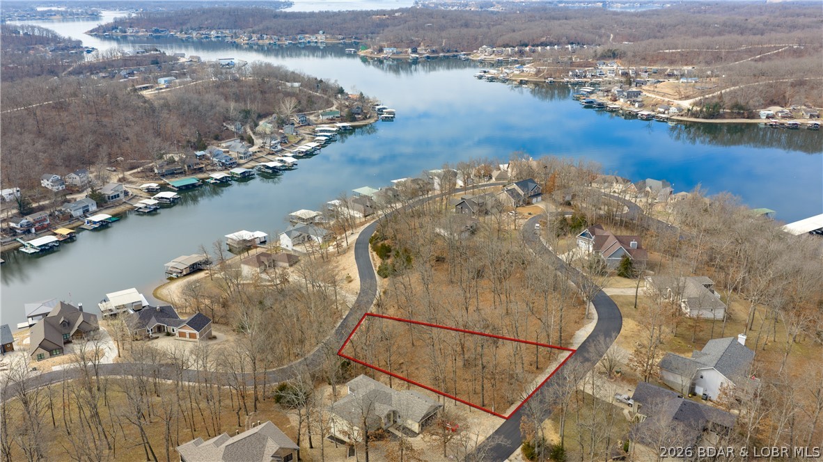 Check out this lakeview lot located in a desirable community offering excellent amenities and convenient access. This property provides the perfect opportunity to build your custom home while enjoying scenic water views. Amenities include a community pool, clubhouse, fitness center, playground & more! Ideally situated just minutes from restaurants and shopping, offering both privacy and convenience. Perfect for full-time living, vacation retreat, or investment property. Don’t miss the opportunity to own a lakeview lot with access to community features designed for comfort and recreation.