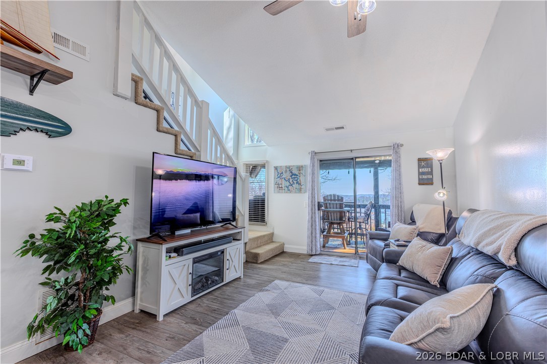 This beautifully updated 2-bdrm, 1.5-bath condo at Steeple Ridge Condominiums (4MM off HH) has been completely remodeled in 2026 and is ready for you to enjoy lake living at its finest. Step into an inviting open-concept layout where the modern kitchen flows into the living area, with stunning views of the lake and community pool. The primary suite, right off the kitchen, features a custom en-suite bathroom with a stylish walk-in shower.  The main level also includes a stackable washer and dryer for added convenience. Upstairs, the oversized loft offers abundant natural light through a large window and includes a custom half bath—perfect for guests seeking their own private space.  Relax on the furnished patio and take in the peaceful views of both the lake and pool—ideal for morning coffee or unwinding.  Boating enthusiasts will love the included 10x24 boat slip with a 3,000 lb lift, ready for your water adventures.  This condo offers easy access by both land and water to popular local attractions and is a golf cart-friendly community, adding to its charm and convenience. Don’t miss your chance to own this exceptional lakefront retreat—schedule your showing today before it’s gone!