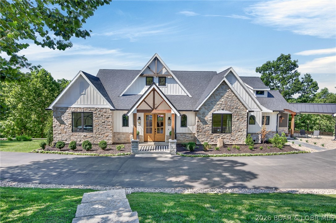 Experience the perfect blend of luxury, comfort & nature in this newly custom-built waterfront retreat. Designed w/ 6 bdrms & 4.5 bths, this home showcases exceptional craftsmanship & upscale finishes throughout. A stunning wall of windows captures beautiful lake views & fills the home w/ natural light. Elegant arched doorways add architectural charm & timeless character, custom cabinetry & detailed millwork elevate the overall design. The LL is an entertainer’s dream, complete w/ a full bar —ideal for hosting family & friends. Perfect for game nights, holidays or summer weekends at the lake, this space was made for gatherings. Step outside to enjoy mornings on the screened-in porch, relax on the expansive deck or gather around the lakeside fire pit for evenings under the stars. W/ generous acreage, waterfront access & privacy, this property offers a rare combination of land, luxury & tranquil lake living, located by popular restaurants, golf courses & attractions. A 2-C garage is complemented by extensive driveway space, providing plenty of parking. More than just a home, this is a private waterfront sanctuary w/ views & peaceful surroundings allowing you to truly relax & breathe.