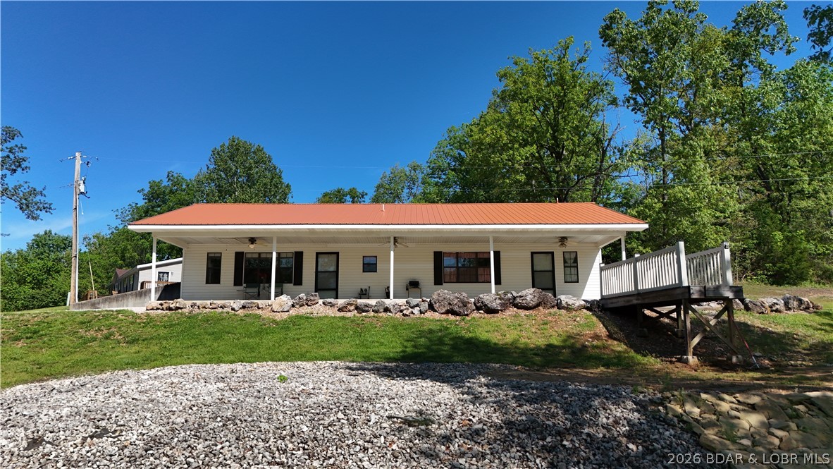 One-owner home, thoughtfully built and well maintained! This 3 bed, 2 bath earth-contact home sits on 4.2 acres of open ground and mature trees, offering a versatile and private setting with a beautiful view of the valley. Designed for efficiency, the earth-contact construction helps keep utility costs low year-round. The open-concept main living area is ideal for large family gatherings, while the spacious master suite features a huge walk-in closet. Convenient main-level laundry plus attic access adds extra storage.
All-electric home with a gas/electric combination cooking stove. A new metal roof provides long-term durability and peace of mind. Outside, the acreage offers endless possibilities—recreation, hobby farming, or room to add a shop or garage—plus multiple storage sheds for equipment and tools. Enjoy your own private shooting range and excellent hunting with abundant turkey and deer. Experience a welcoming setting with great neighbors while still maintaining privacy. Located just minutes from Eldon and Lake Ozark, and located in the School of the Osage School District.