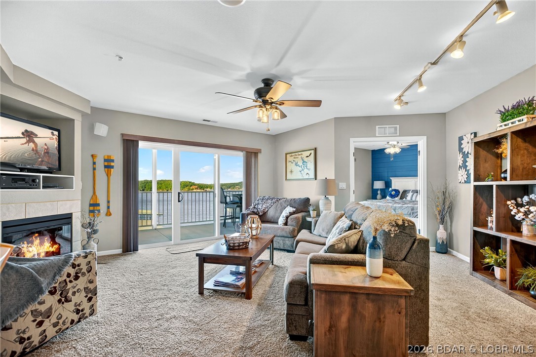 Enjoy easy lakefront living in this beautifully positioned 3-bedroom, 2-bath Seascape condo in the heart of Osage Beach. The open floor plan is filled with natural light and designed to capture lake views from the main living areas and private deck. With BRAND NEW STAINLESS STEEL APPLIANCES, modern finishes, and generous living space, this condo is move-in ready and ideal for full-time living, a weekend retreat, or investment use. Convenience is a standout here, with zero-step access from the front door to the dock and the unit located just steps from the elevator. The property includes a 14x40 deep-water boat slip and PWC slip, with easy dock access. Building A is concrete and steel, offering a quiet, solid feel. Recent community improvements include a new roof last year, new steps three years ago, a rebuilt elevator, a new pool bathroom, and exterior repainting. Sidewalks and well-maintained roads add to the appeal along with its central location. On-site ice is available for purchase for added convenience, along with security added for holiday weekends.  A pre-listing inspection has been completed, and a one-year home warranty is included for peace of mind.