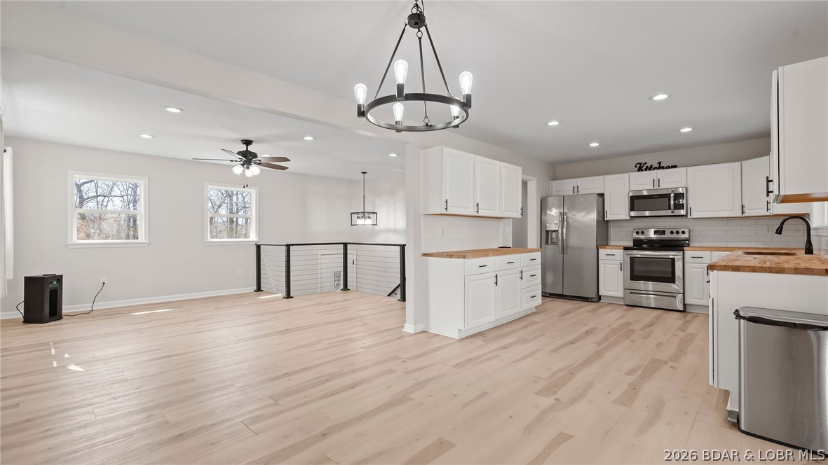 Lake view home with modern updates! This newly remodeled home offers the perfect blend of comfort, style, and flexibility, all set against a peaceful backdrop with beautiful views of the lake. Discover a fresh, updated interior designed for easy living and entertaining. Every detail has been thoughtfully refreshed, giving you a move-in-ready space to enjoy from day one. Outside, the property truly shines with an additional outbuilding ideal for whatever fits your lifestyle. Create your dream she shed, a private man cave, home office, workout space, or hobby studio… the possibilities are endless, PLUS it as electrical in place! Whether you’re looking for a full-time residence, weekend escape, or investment opportunity, this property delivers charm, versatility, and a view you’ll never get tired of!