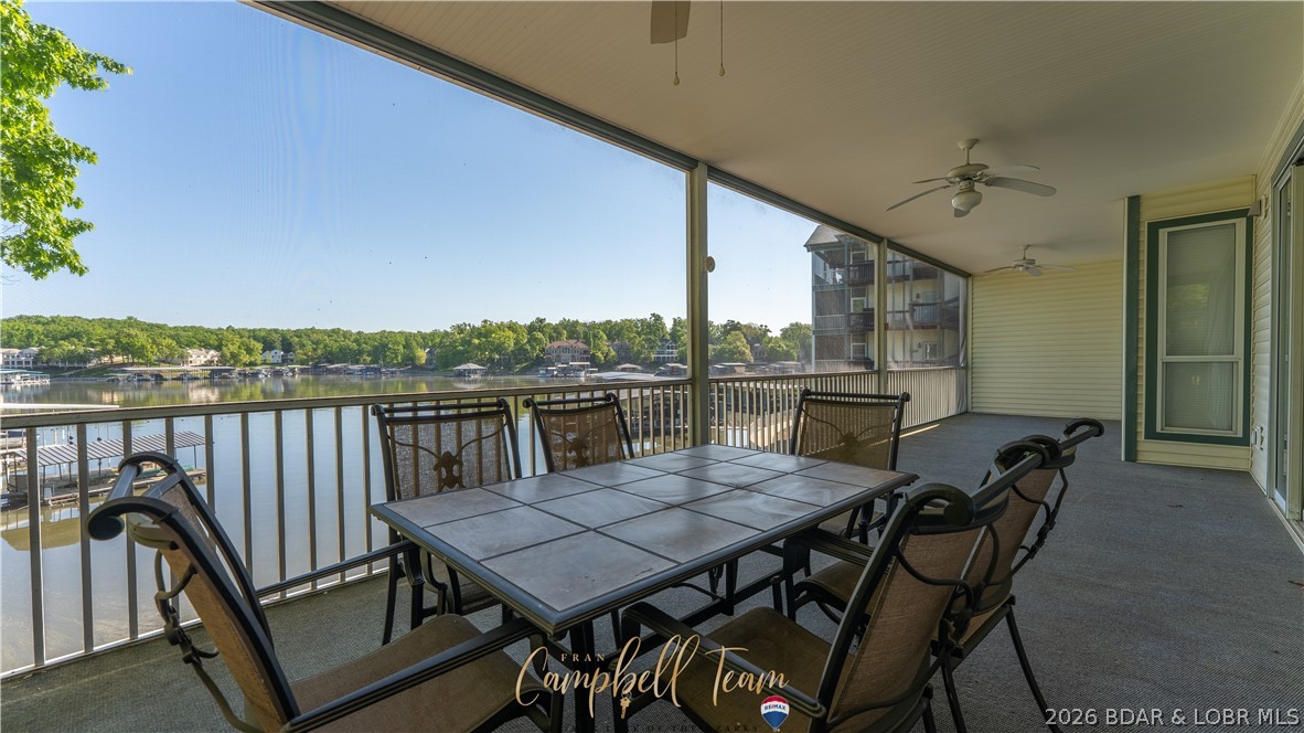 Lakefront, turnkey, and loaded with the extras buyers want. This 3 bedroom, 3 bath end-unit condo at Evergreens on the Lake includes the furniture, 12x28 covered boat slip, and boat hoist. A 1-car detached garage can be added for additional $. The open layout is designed for easy lake living with spacious gathering areas, a fireplace, and a huge screened deck overlooking the water. Located at the 18 MM in Sunrise Beach, this cove-protected setting offers a quieter lakefront feel while keeping you close to Lake Ozark and Osage Beach by land, plus Dog Days and Backwater Jacks by water. Evergreens on the Lake is a well-maintained complex with new roofs in 2024, community pool, clubhouse, tennis courts, pickleball, playground, and trailer parking. Whether you want a full-time lake home, weekend retreat, or rental-friendly investment, this condo delivers comfort, convenience, and a true Lake of the Ozarks lifestyle.