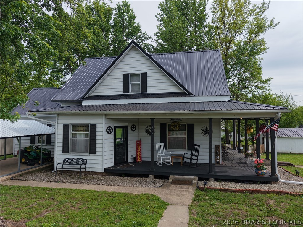 BACK ON THE MARKET — at absolutely no fault of the seller!Set on over a half-acre corner lot, this stunning home welcomes you with a beautiful front porch, back deck and timeless charm. Step inside to soaring ceilings and beautiful woodwork that instantly make the space feel warm and inviting. The main level is designed for gathering, featuring a dining room with a bar opening into the kitchen—perfect for entertaining. Just off the kitchen, you’ll find a convenient pantry, laundry area, and access to the back deck. The spacious main bathroom offers a spa-like feel with a separate shower and a jetted Jacuzzi tub. Through classic pocket doors, the living room creates a cozy space ready for new memories to be made. Upstairs, you’ll find two large bedrooms filled with natural light, each with generous closet space, along with a versatile flex room—ideal for an office, nursery, or oversized walk-in closet. A half bath upstairs adds extra convenience.
Outside, enjoy a fenced yard perfect for BBQs, pets, or simply relaxing, with plenty of room for a pool if you choose. This home is full of character and ready for its next chapter.