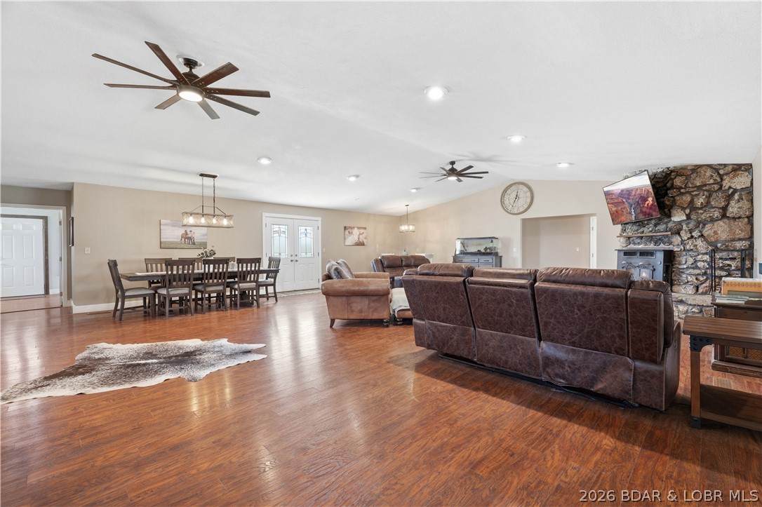 Discover the perfect blend of comfort, functionality, and rural charm with this exceptional 80-acre turnkey cattle farm. The updated 3,028 sq ft home offers 4 bedrooms and 4 bathrooms, fully remodeled in 2019 with modern finishes throughout. The land includes 75 acres of pasture and 5 acres of woods, fully fenced and cross-fenced for rotational grazing, with three ponds and four automatic waterers. Outbuildings include a 40x60 barn with 15-foot lean-tos and 100-amp service, a 22x40 open-front three-car garage, a 12x24 insulated six-run dog kennel with heating and cooling, a 10x14 well house with storage, a chicken coop, and two garden areas. A storm shelter sits just off the back patio. Inside features an open-concept layout with a large mudroom, laundry, guest bath, and kitchen flowing into the living area. The primary suite offers a walk-in shower and Jack-and-Jill vanity. Three additional bedrooms provide flexible space. Dual HVAC systems and separate water heaters add efficiency. Enjoy peaceful views from the front patio and relax on the screened-in back patio. Move-in ready and fully set up for cattle or country living.