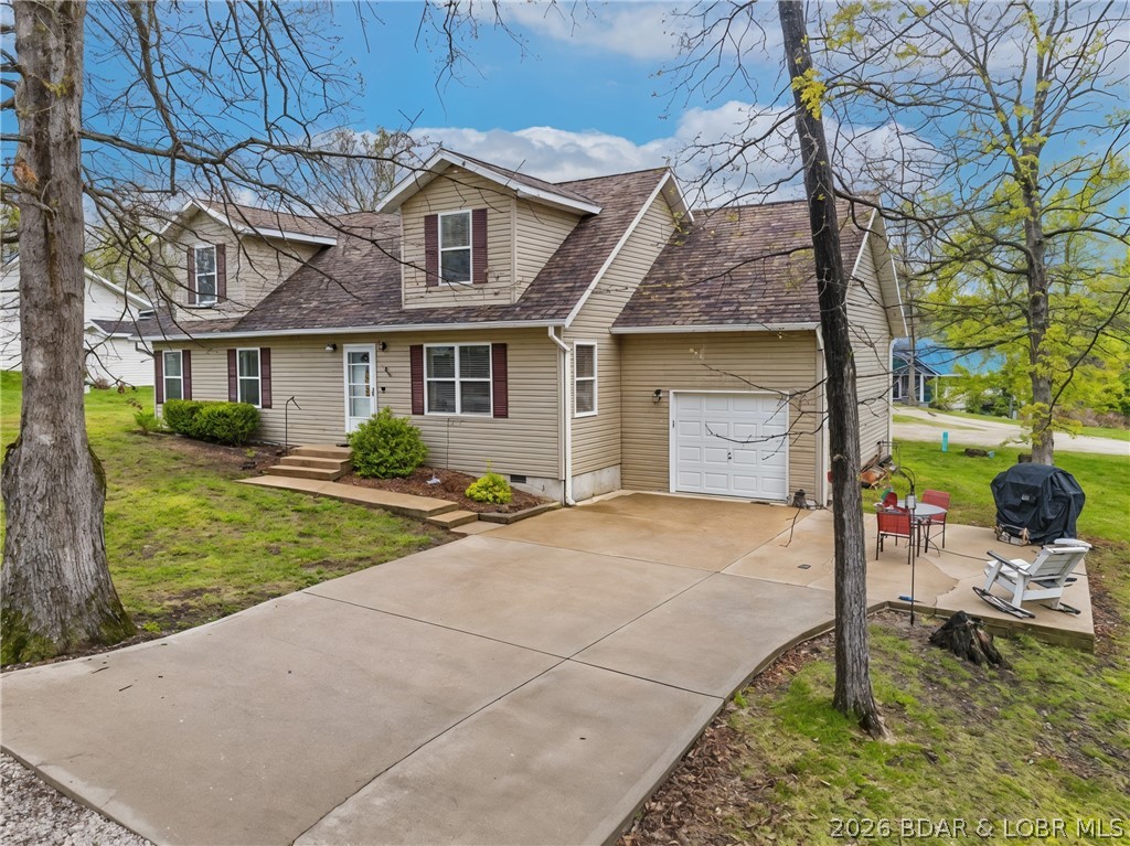 Fresh opportunity for this 4-be, 3-bath home offering over 2,000 square feet with a layout that gives you flexibility—main level living with additional bedrooms upstairs for guests, kids, or a dedicated work-from-home setup. The living room flows comfortably into a generously sized kitchen. Bedrooms are well-proportioned, and the overall footprint makes practical sense for everyday use. Recent updates include a newer roof and gutters, giving buyers added peace of mind where it counts. Upstairs, you’ll find two large bedrooms offering impressive square footage—ideal for creating oversized guest rooms, bunk spaces, or hobby areas. These spaces present a great opportunity for a little TLC and personal customization to truly make them your own. The attached garage adds functionality. Set on a manageable lot in a quiet, established neighborhood, the property is conveniently positioned with easy to local hot spots like Paradise restaurant and everything the Westside offers and its just a quick jaunt over the Community Bridge to all Osage Beach/Lake Ozark amenities. With your own finishing touches, this is worth a look at its new price point.