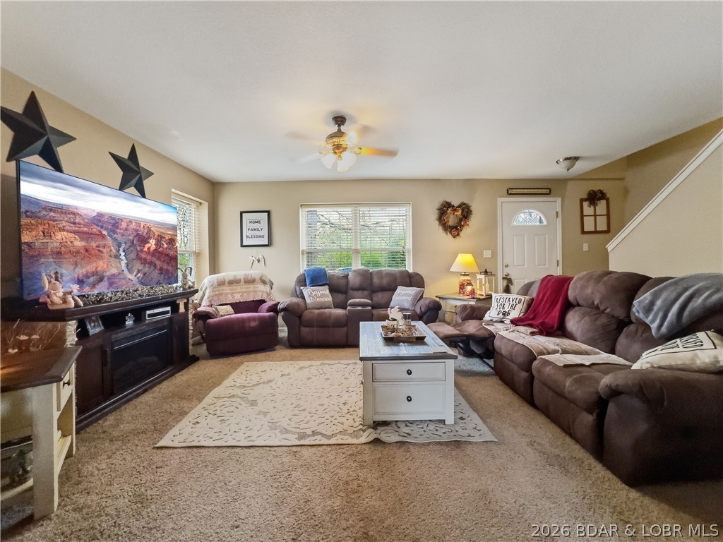 Fresh opportunity for this 4-be, 3-bath home offering over 2,000 square feet with a layout that gives you flexibility—main level living with additional bedrooms upstairs for guests, kids, or a dedicated work-from-home setup. The living room flows comfortably into a generously sized kitchen. Bedrooms are well-proportioned, and the overall footprint makes practical sense for everyday use. Recent updates include a newer roof and gutters, giving buyers added peace of mind where it counts. Upstairs, you’ll find two large bedrooms offering impressive square footage—ideal for creating oversized guest rooms, bunk spaces, or hobby areas. These spaces present a great opportunity for a little TLC and personal customization to truly make them your own. The attached garage adds functionality. Set on a manageable lot in a quiet, established neighborhood, the property is conveniently positioned with easy to local hot spots like Paradise restaurant and everything the Westside offers and its just a quick jaunt over the Community Bridge to all Osage Beach/Lake Ozark amenities. With your own finishing touches, this is worth a look at its new price point.