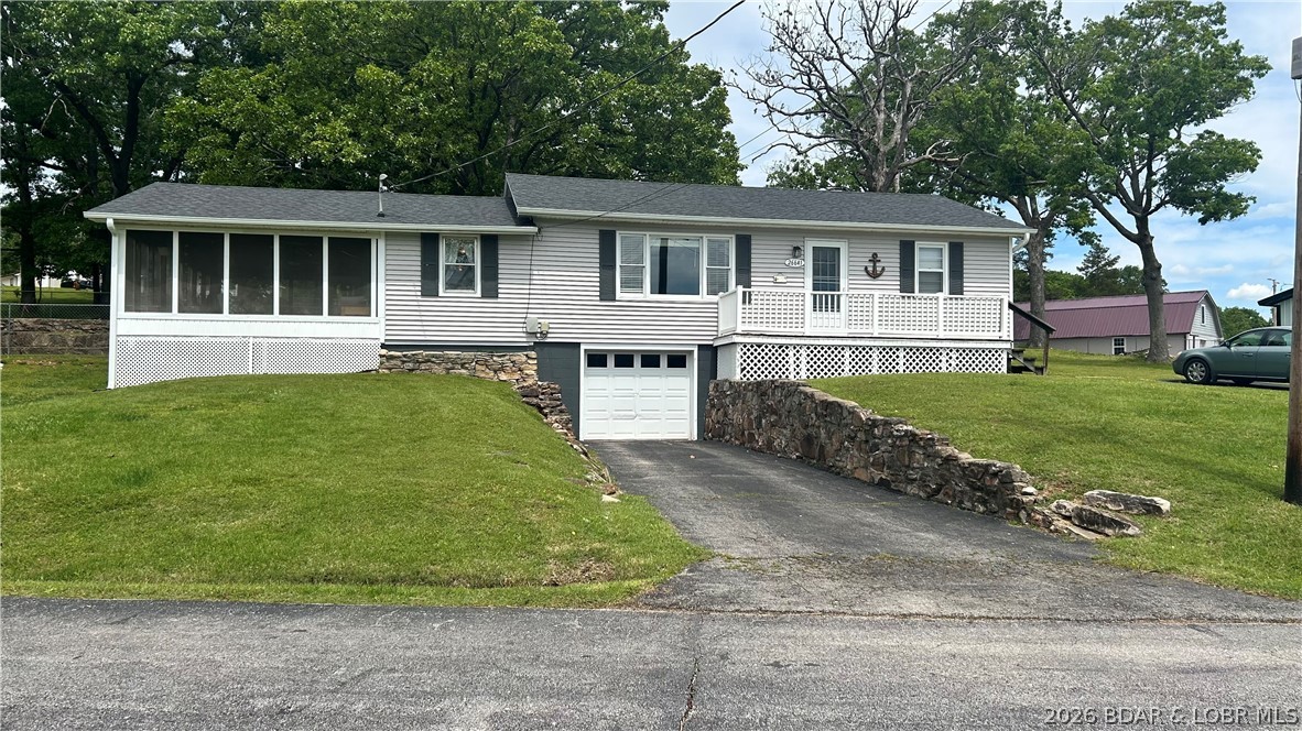 Charming 3-bedroom, 2-bath ranch-style home on a spacious double lot in the highly desired Cole Turkey Acres community. Enjoy peaceful lake views from the screened-in porch and a fenced, terraced backyard ideal for gardening, pets, play, or entertaining.

This comfortable single-level home features an open, easy-flow layout with three well-sized bedrooms and two full bathrooms, offering convenient everyday living or a low-maintenance weekend retreat.

Outdoor and lake-life amenities include:

Community park and boat ramps just down the road
Lone Star Marina nearby with annual boat slip rentals available
Paved roads for easy, year-round access
Perfect as a full-time residence, vacation home, or investment property, this welcoming lakeside home lets you enjoy all that Cole Turkey Acres has to offer.