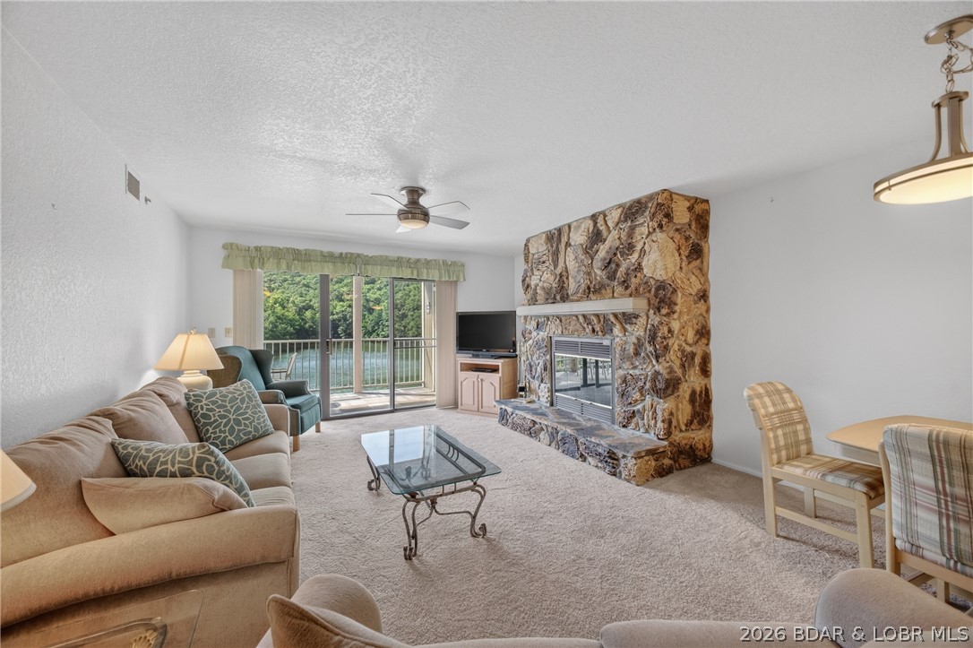 Prime Osage Beach Lakefront Opportunity! This furnished, turn-key 2BR, 2BA condo overlooks the State Park and is perfect as a full-time residence, weekend getaway, or investment property.

Recent updates include fresh paint in the kitchen and bathrooms, a new living room light fixture and ceiling fan, plus updated dining room lighting, giving the condo a fresh, modern feel.

Includes a 10x28 boat slip with a 12,000-lb hoist, with a second 10x28 boat slip available for purchase for additional $$$.

Relax on the shaded lakeside deck. Community amenities include 2 pools, playground, BBQ pavilions, boat ramp, trailer parking, dog park, and game area.

Conveniently located near shopping, dining, golf, and entertainment, yet tucked away in a peaceful cove on the Grand Glaize Arm—ideal for fishing, watersports, cruising, and easy access to the Lake of the Ozarks Shootout.

Outstanding location, excellent rental potential, and the rare opportunity for additional dock space make this lakefront condo one you won't want to miss!