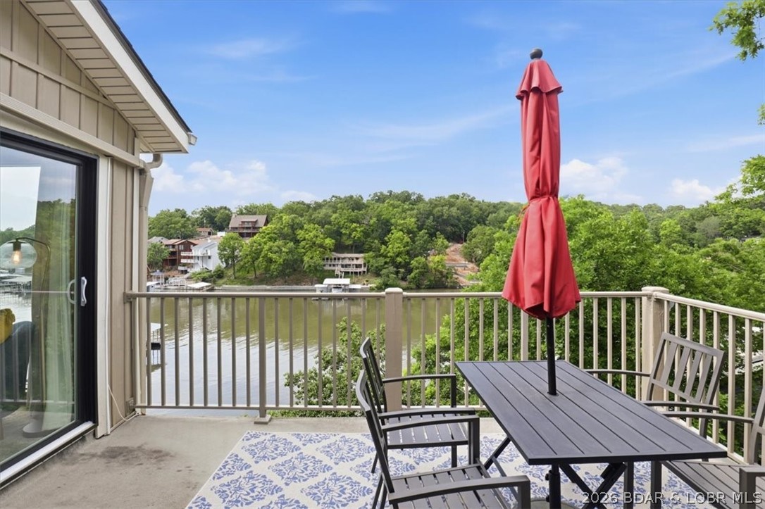 Absolutely Priced to Sell!!!!Wonderful Lake Views from your Deck over the lakeside, comes Turn Key- Continue short term Rentals or use as your personal Retreat!!  3- Outdoor Pools, Tennis courts, Playground and Clubhouse.  Assigned parking so you always have a place to park at the unit.  2- Bedroom, 2 Bathrooms, Top Floor unit is ready for New Owners.  Welcome Home! Offers welcomed!