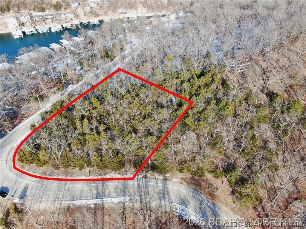 Are you ready to build your lake home? Check out this fantastic opportunity to own a lot located off Horseshoe Bend, offering a seasonal lake view and situated close to Bagnell Dam and in the Osage School District.