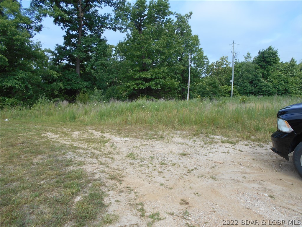 Nice nearly level residential building lot located adjacent to Hawk Lake Estates!  Would be an easy lot to build on, there are 2 residences adjacent to this lot, with 3 newer residences planned across the street. City water and sewer are available.  Very desirable location with easy access to Hwy 5.  Developers this would be prime time to pick up an inexpensive lot for a spec house in Sunrise Beach.