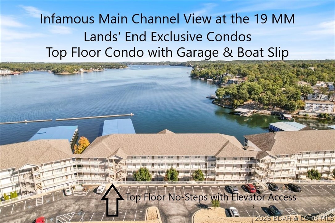 Top Floor with No-Step Entry includes the hard-to-find Garage, a 3-Seater Gas Golf Cart, and a Boat Slip at Lands' End Exclusive Condos with that infamous 7-Mile View down the main channel at the 19 MM. It is a TOTAL PACKAGE! Location! Location! Location! It matters! Plus 9 ft. interior ceilings, 3 bedrooms and 2 full baths, and a huge waterfront deck. This 1,520 sq ft updated condo has a large breakfast bar & SS appliances, ceramic & LVP flooring. The primary suite has a granite double bowl vanity and a whirlpool tub, separate shower & a walk-in closet. Bedroom 2 has direct bathroom access. MFL with full size W/D. All you have is an electric bill. Everything else is included, propane for the gas fireplace, water, sewer, trash, cable TV, Internet, ext. maintenance, lawn care with sprinklers, snow removal, 3 pools, including the lazy river pool, splash pad pool and the main pool with zero entry, exercise facilities and clubhouse with pool table, playground and basketball. (This condo front door entry, the garage, and the boat slip are all handicap accessible with no steps via the elevators and wide golf cart path, as well as the main complex pool with zero entry.)