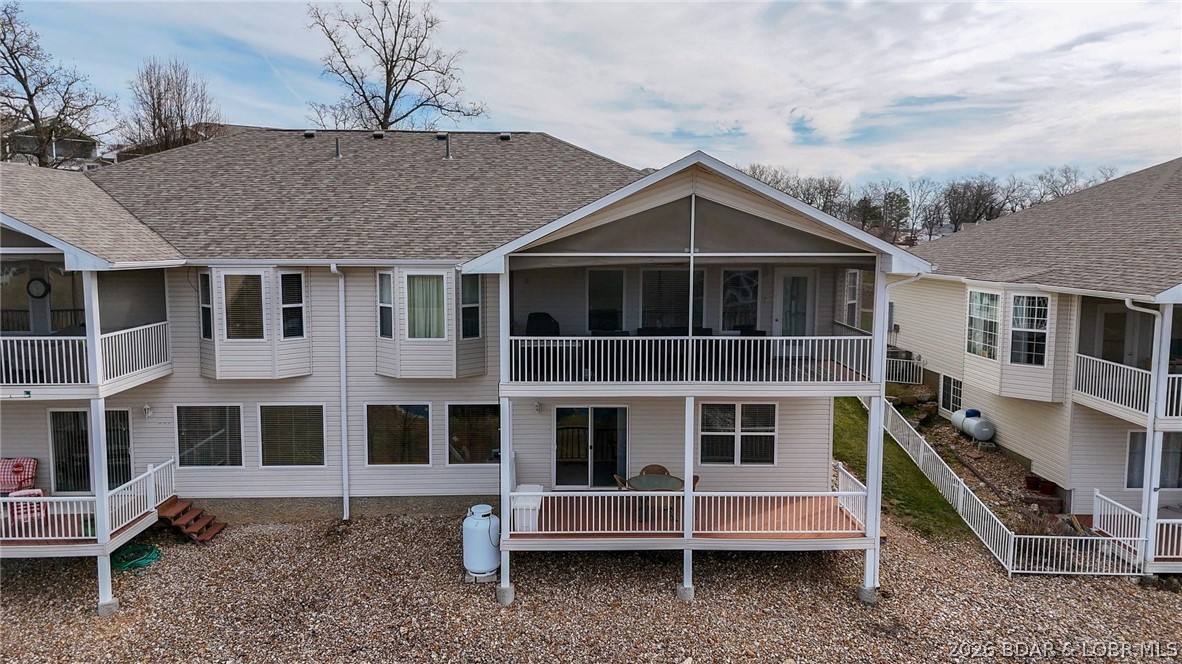 Enjoy easy, low-maintenance living in this spacious 3 bed / 3 bath villa located in a popular gated community in Osage Beach. With spacious living, offering: 2 large living areas, game room w/bar & laundry on both floors—perfect for everyday living or hosting family and guests. CHAIR LIFT between levels adds valuable accessibility & long-term convenience. The heated/cooled 2-car attached garage provides year-round comfort & extra storage. Enjoy peaceful views of the subdivision ponds/fountains from your decks. While some finishes reflect their era, the home has been well cared for & has had numerous updates over the past eight years (see listing attachments for full list), allowing the next owner to personalize over time if desired. This maintenance-provided community is popular w/buyers looking to simplify or downsize without giving up space. Residents enjoy a community pool & social gatherings. Conveniently located near the hospital, Elks Lodge, grocery stores, & restaurants. Boat slip is not included but may become available within the community to rent or purchase. Villas in this location & condition offering this much space are rare—schedule your showing today.