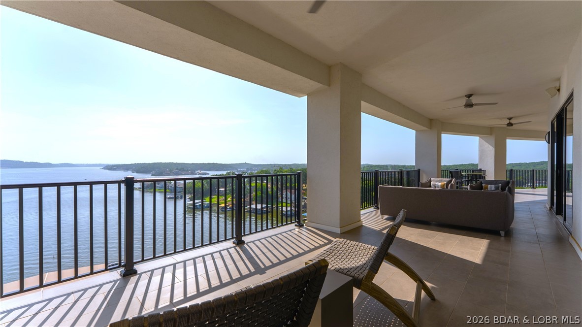 Welcome to unparalleled luxury at Cypress at the Lake, widely recognized as THE premier condo development at Lake of the Ozarks perched at the Osage 12MM. Offering the 2nd largest floor plan in the complex, this stunning property captures breathtaking panoramic lake views from an 880 sq ft east-facing balcony, the perfect place to enjoy spectacular sunrises each morning. Every bedroom offers lake views with its own en-suite bath, while upscale finishes include solid core doors, custom Ozark closet systems, Harris blackout shades, Sonos ceiling audio, premium furnishings, wet bar with ice maker, dual water heaters & full KitchenAid appliance package. Enjoy unmatched amenities including an infinity pool, cabanas, lakeside firepit, impectable grilling station, fitness center, parking garage,  high-speed elevator & overall a stunning clubhouse area. Also includes 16x48 slip with 24,000lb poly lift & walk-around platform with remote.