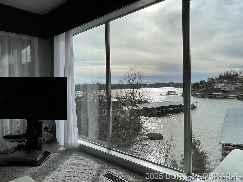 Awesome 3 bedroom 3 bath condo unit with the perfect much desired HH location on the 12 mile marker. This is a very nice unit that has been well maintained with lots of nice updates in the last couple years. Large master suite with bathroom on lakeside with outstanding views. A second master on the lower level with lots of space for your guests with access to the second lakeside deck that unit has to offer. Nice open floor plan on the main level with kitchen and dinning area opening up to large living room with a wall of glass to enjoy the views. This packages comes with 1 dock slip and pwc slip with dock slip being 12X30. Regatta Bay has lots too offer with 2 pools, clubhouse, tennis court, pickleball, playground, and much more. Unit comes mostly furnished and ready to go to get your lake life dreams started. Use as your own personal oasis or use as an investment on the vacation rental program or use as both.