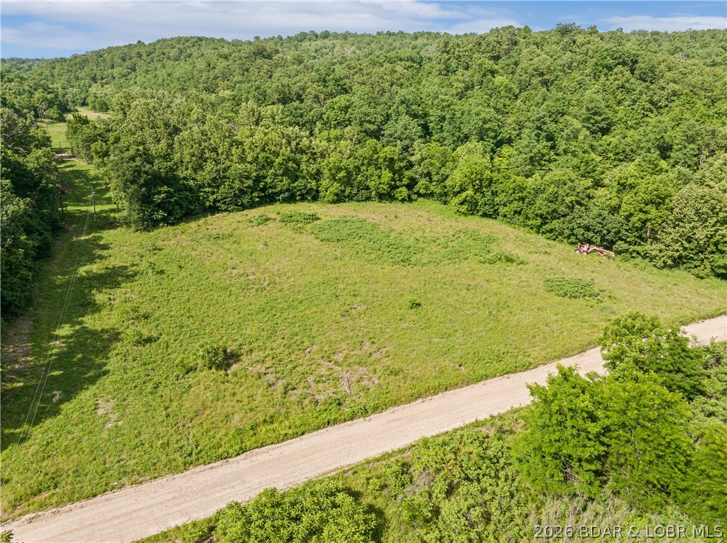 Country acreage that is mostly open and some Wooded area.  This is a perfect location for a Cabin, Camper, RV, or Home.  There is a Wet Weather Creek that runs along the corner of the property.  It is close to Tunnel Dam River that is great for canoeing and fishing.  Recently Surveyed.