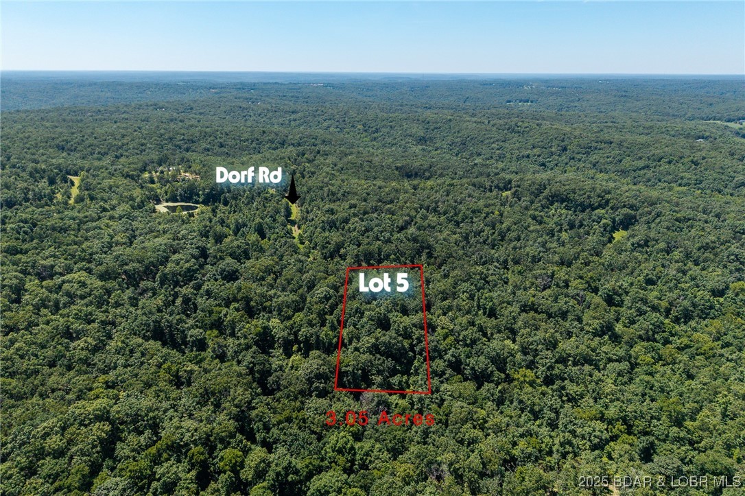 Excellent 3.05 acre tract (lot 5) located in Village of Forest Trails in Roach, MO off AA and super close to the Larry R. Gale public boat launch area. Many different parcels to choose from or add to increase acreage. Roads are in and underground electric is provided to each lot. Very private with the convenience of town just a few minutes away! Minimal rules and regs.