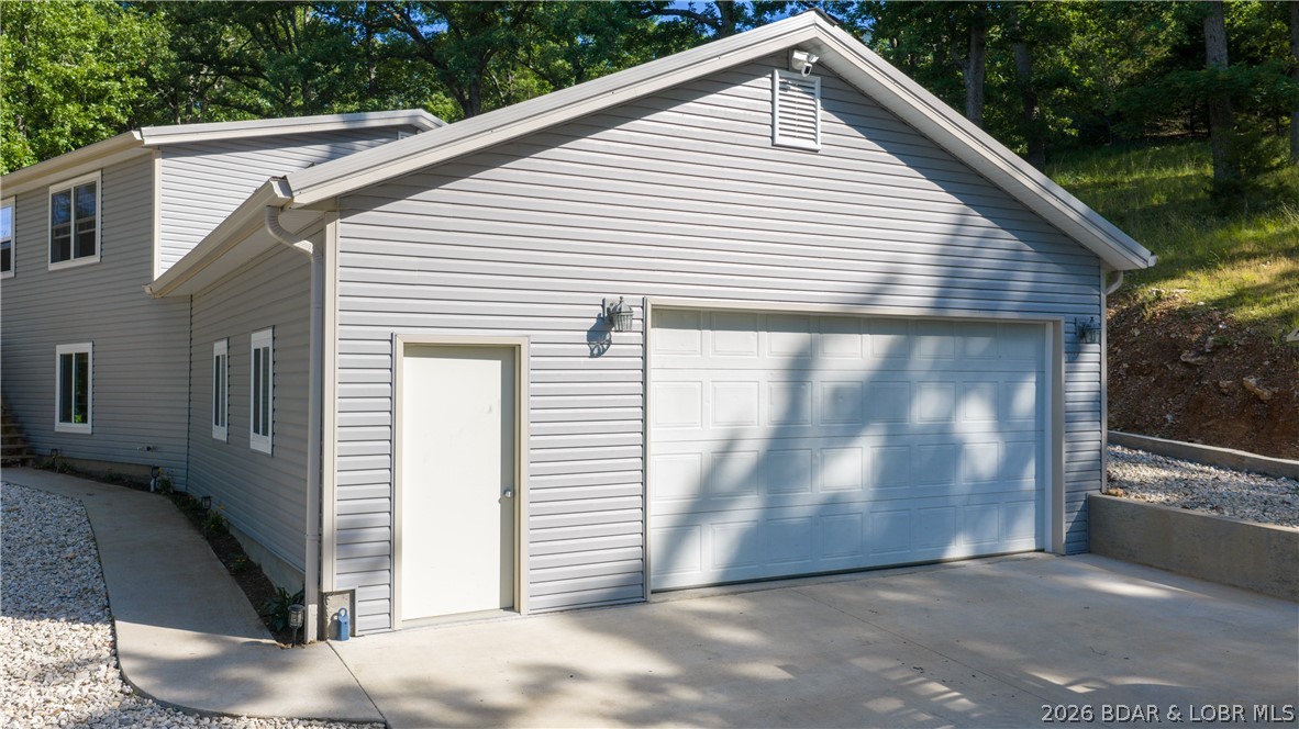 This well built 2020 home showcases quality craftsmanship and pride of ownership throughout! Offering approximately 1,600 sq. ft., this 3 bedroom, 2 bath home features cathedral ceilings, large deck, an oversized 2-car garage and sits on a spacious 3/4 acre lot with plenty of parking and a long driveway for convenience. The exterior has been beautifully finished with attractive white rock landscaping for low maintenance and great curb appeal. You’ll appreciate the energy efficiency of spray foam insulation. The crawl space has been thoughtfully improved with spray foam insulation, vapor barrier, and a dehumidifier system. The home is serviced by a 300’ deep well and an LPP septic system featuring two 1,000 gallon tanks. Enjoy seasonal lake views in the winter along with lake access that includes a community boat ramp and day dock. Whether you’re looking for a full time residence or weekend getaway, this newer home offers comfort, quality, and a peaceful setting close to the water!