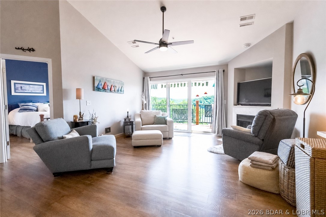THIS UNIT COMES WITH A 10x24 Boat slip with hoist. The complete package with a place to put all your water toys. Top Floor location with the 29 foot lake side deck & best panoramic State Park views. 1159 SF, 3 bedroom, 2 bath unit with vaulted ceilings, fireplace, end unit privacy, pool is located right across the street from unit front door. Located at the Grand Glaize Arm at the 5MM, Park Place on the Lake is situated adjacent to the State Park, has plenty of green space and trails to walk, ride your bike, walk the dog. Enjoy the gorgeous view of the State Park, forever untouched.  Amenities include a clubhouse with workout equipment, pool, fire-pit, trailer parking and a whole complex water softener. HOA dues include water, sewer, trash and Whisper Entertainment Package that includes TV and Wi-Fi. Be sure to look at the video tours!
