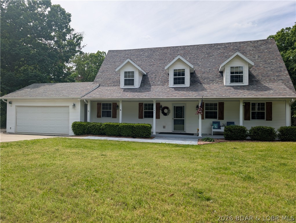 This is a Beautiful, large home in a country subdivision on a little over an acre that includes an above-ground pool and a separate shop within a stone's throw of Lake of the Ozarks, MO. The property comes with an extra lot that has been enjoyed for separation from neighbors, but could be sold or built on in the future. The home has wonderful amenities, including a large deck out back, partially covered and sporting a great view of the wooded back yard past the house...There is a swimming pool and a large shop behind the house...In front, there is extra parking and a two-car attached garage included...Inside the home, it is tastefully decorated with quality finishes in every room. There is a cozy wood fireplace that accentuates the living space and gives a very homey feel. The kitchen, dining, and living are all open to each other, so the conversation could flow in the room in a very open way. If you are looking for lots of space, a nice property, a shop, a pool, and lots of quiet - come and take a look - your own little Shangri-La- a remote and idyllic paradise. And very affordable, too...