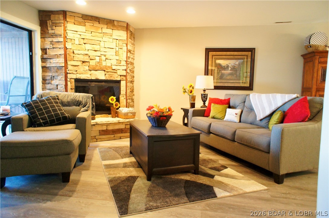No other complex has all of the amenities as the KNOLLS. Indoor and Outdoor pools, Indoor and Outdoor Tennis courts, Pickle Ball, Basketball, playgrounds, swim docks, boat ramp, swimming areas, Clubhouse, workout facility, hot tub area, and Sauna.  This 2 bedroom 2 bath condo offers the incredible main channel views, along with all the protection you need for your boat located in a protected cove. within steps from the front door.  The condo recently updated with paint, flooring, new appliances, painted cabinets. Granite countertops.  A super efficient HVAC system was installed a year ago.  This is like buying a new unit. The unique floorpan allows you to have the opportunity to lock one side of the condo out for additional rental income. If you choose.  Only a few steps away from the parking lot, another positive aspect the unit has to offer.  I almost forgot there is a jetted tub in the Primary bedroom.