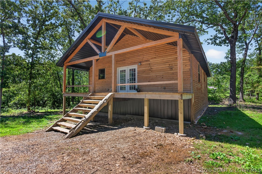 This 3 bed 2 bath Truman Lake home presents you with an amazing opportunity to make it your own! Located in a great Truman Lake subdivision on 1.98 acres +/- this home offers comfort and relaxation. Boat launch on Truman Lake is located just minutes away giving you easy access to the Truman Lake! This home is also close to town, but still gives you the country peace and quiet you're looking for. This home is being sold with an amazing chance for you to come in and add your own finishing touches and make this property your dream Truman Lake getaway! Call today!
